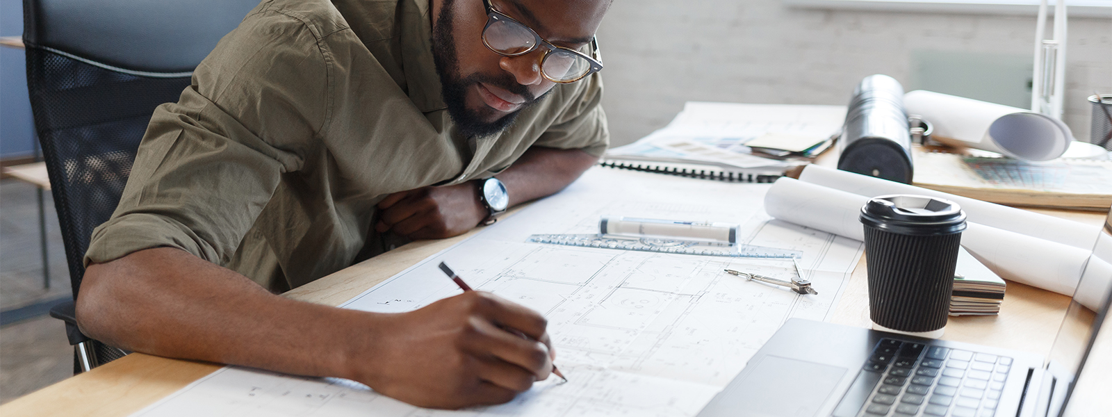 Architect reviewing filing drawings